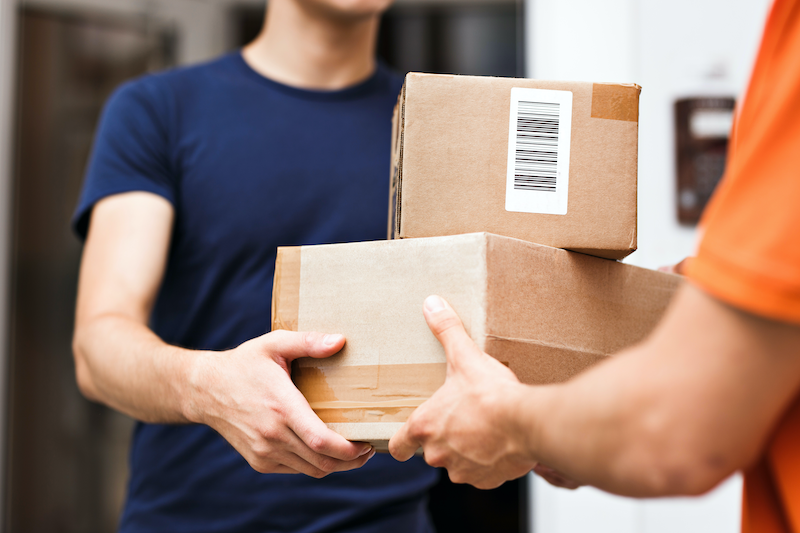 Delivery Person Dropping off Packages to Customer