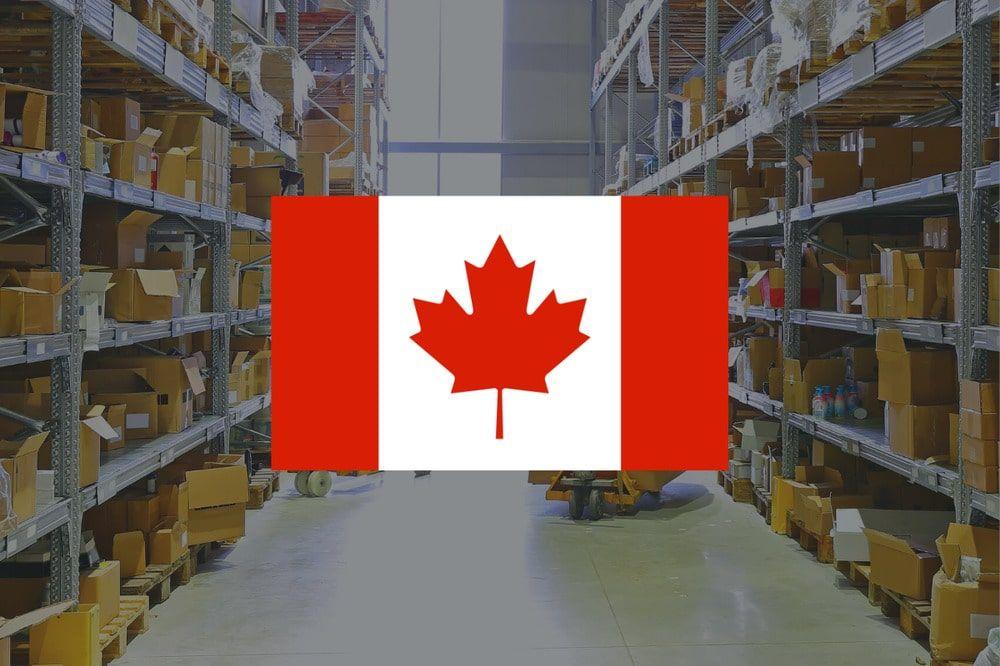 Canada flag in foreground of pick and pack ecommerce fulfillment center