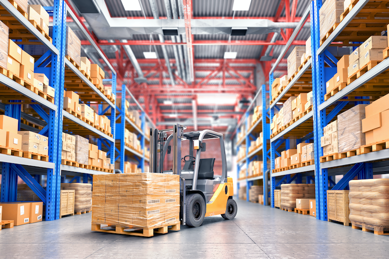 Warehouse with boxes and forklift
