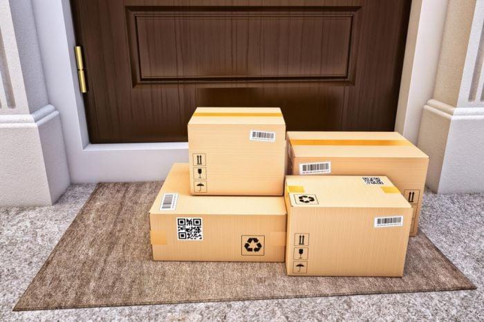 Shipping cartons stacked and ready for B2C order delivery